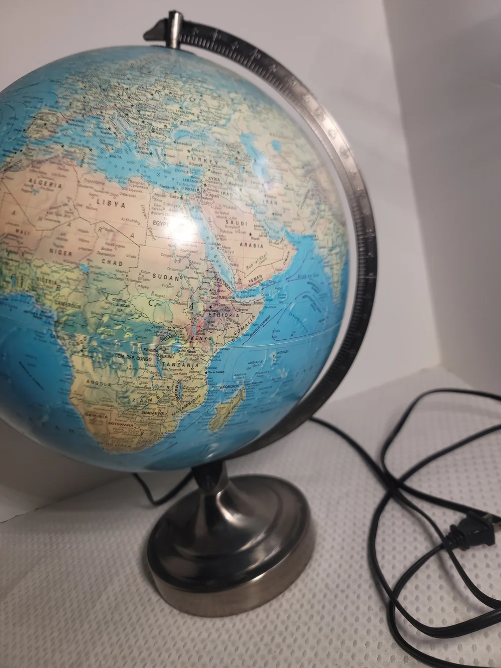 Illuminated Blue Table Globe on Metal Stand